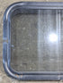 Used Black Radius Non Opening Window : 24 1/4" W x 16 3/4" H x 1 7/8" - Young Farts RV Parts