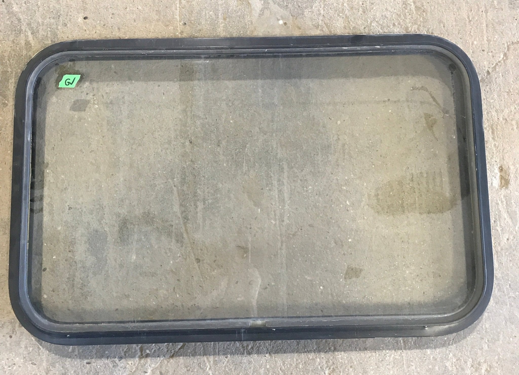 Used Black Radius Non - Opening Window : 32" W X 19 1/2" H X 2" D - Young Farts RV Parts