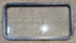 Used Black Radius Non Opening Window : 41 1/2" W x 21 1/2" H x 1 1/2" - Young Farts RV Parts