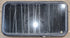 Used Black Radius Non Opening Window : 41 1/4" W x 21 1/4" H x 2" - Young Farts RV Parts