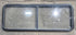 Used Black Radius Non Opening Window : 60 1/4" W x 21 3/4" H x 1 5/8" D - Young Farts RV Parts