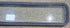 Used Black Radius Non Opening Window : 72 1/4" W x 11 3/4" H x 1 7/8" - Young Farts RV Parts