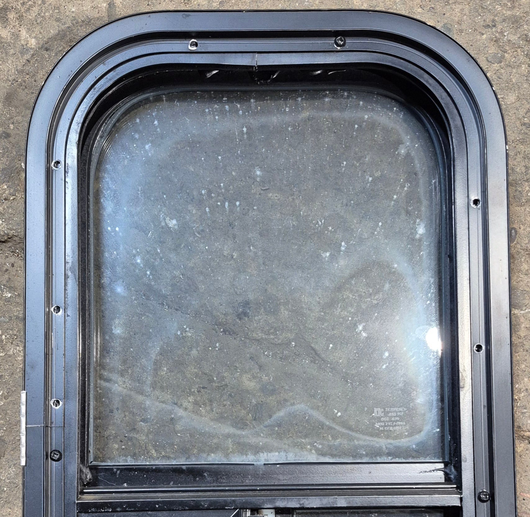 Used Black Radius Opening Window : 11 1/2" W x 21 1/4" H x 1 3/4" D - Young Farts RV Parts