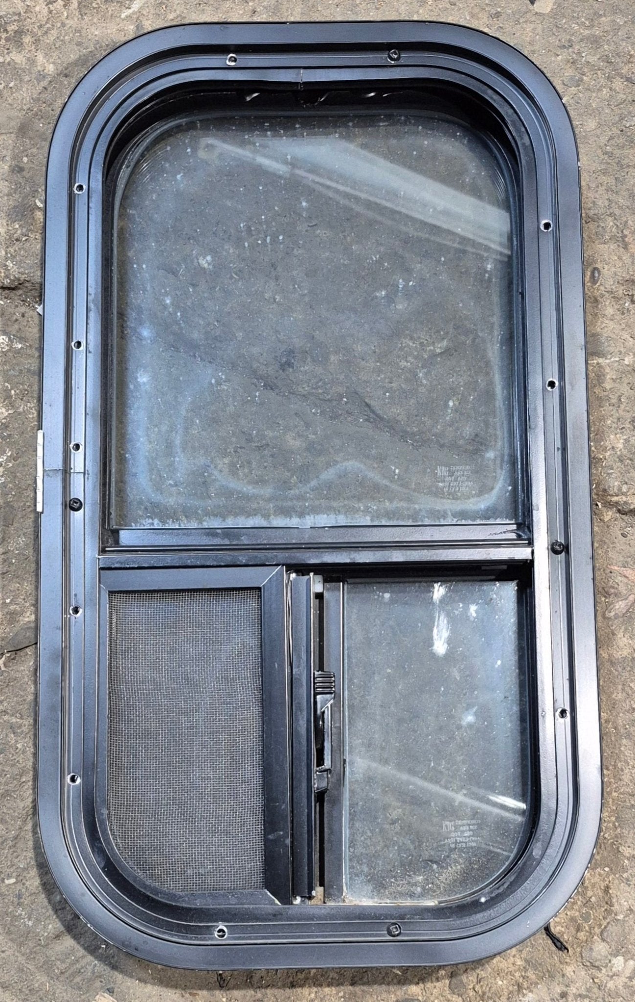 Used Black Radius Opening Window : 11 1/2" W x 21 1/4" H x 1 3/4" D - Young Farts RV Parts