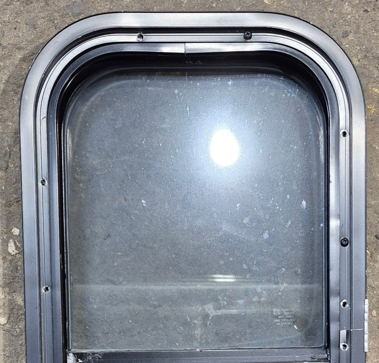 Used Black Radius Opening Window : 11 1/2" W x 21 1/4" H x 1 3/4" D - Young Farts RV Parts