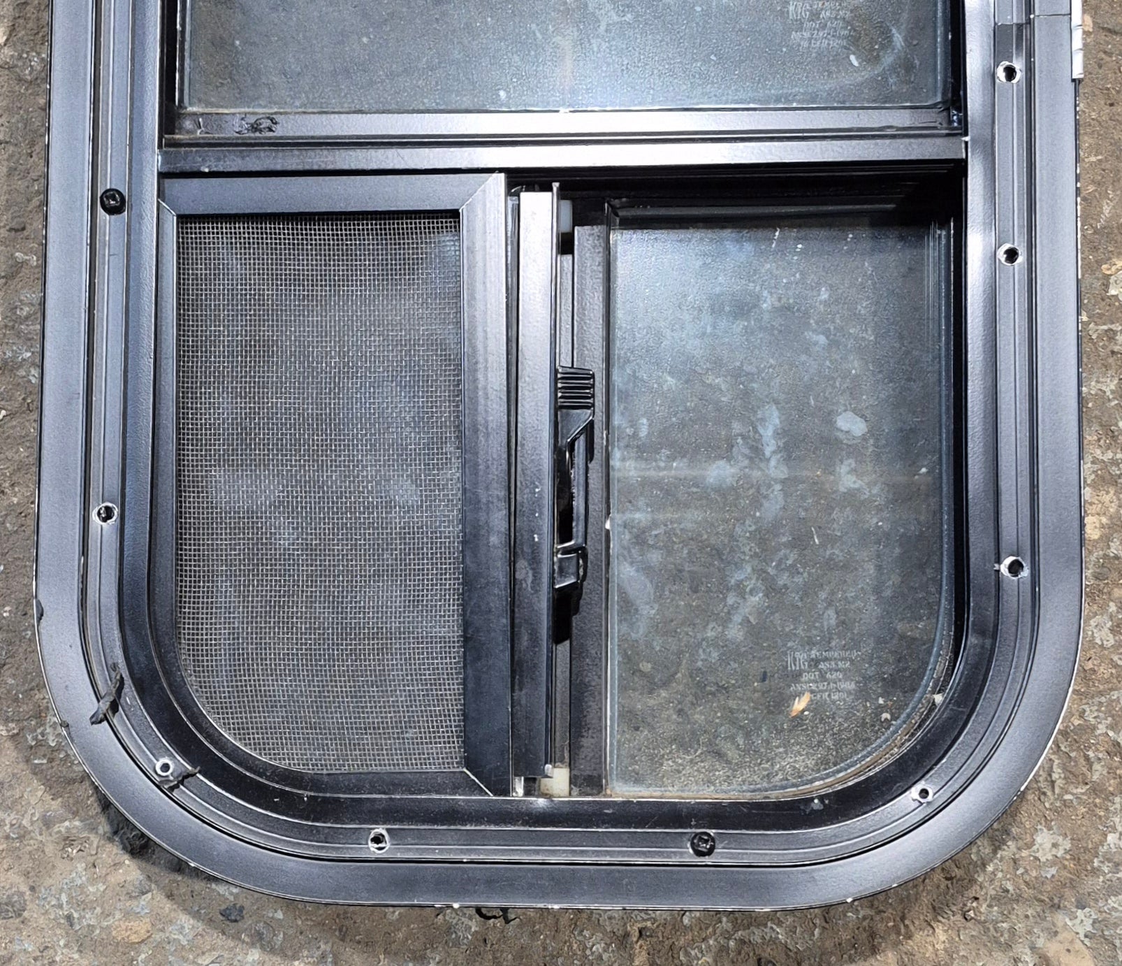 Used Black Radius Opening Window : 11 1/2" W x 21 1/4" H x 1 3/4" D - Young Farts RV Parts