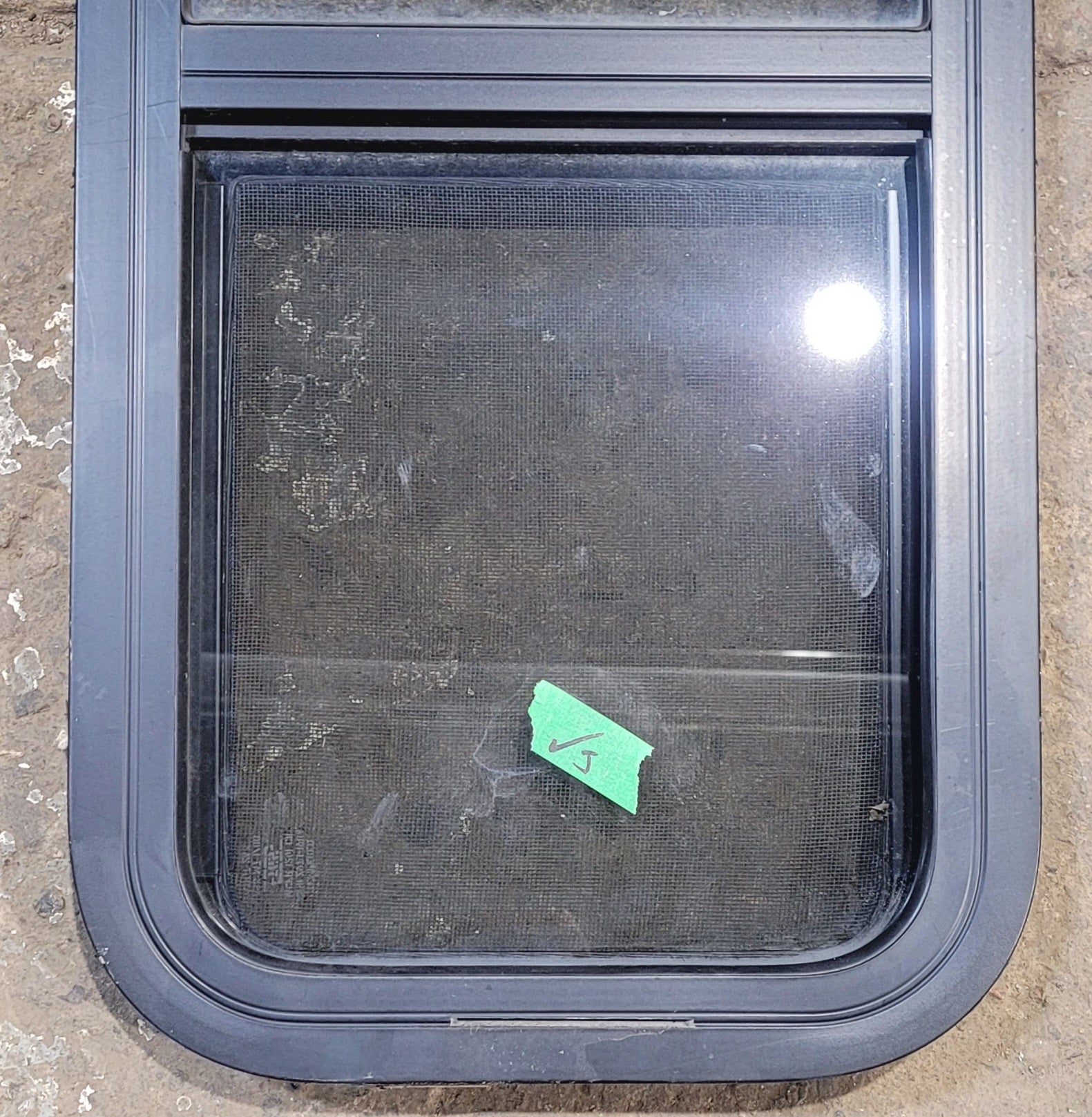 Used Black Radius Opening Window : 11 1/2" W x 26 1/2" H x 1 3/4" - Young Farts RV Parts