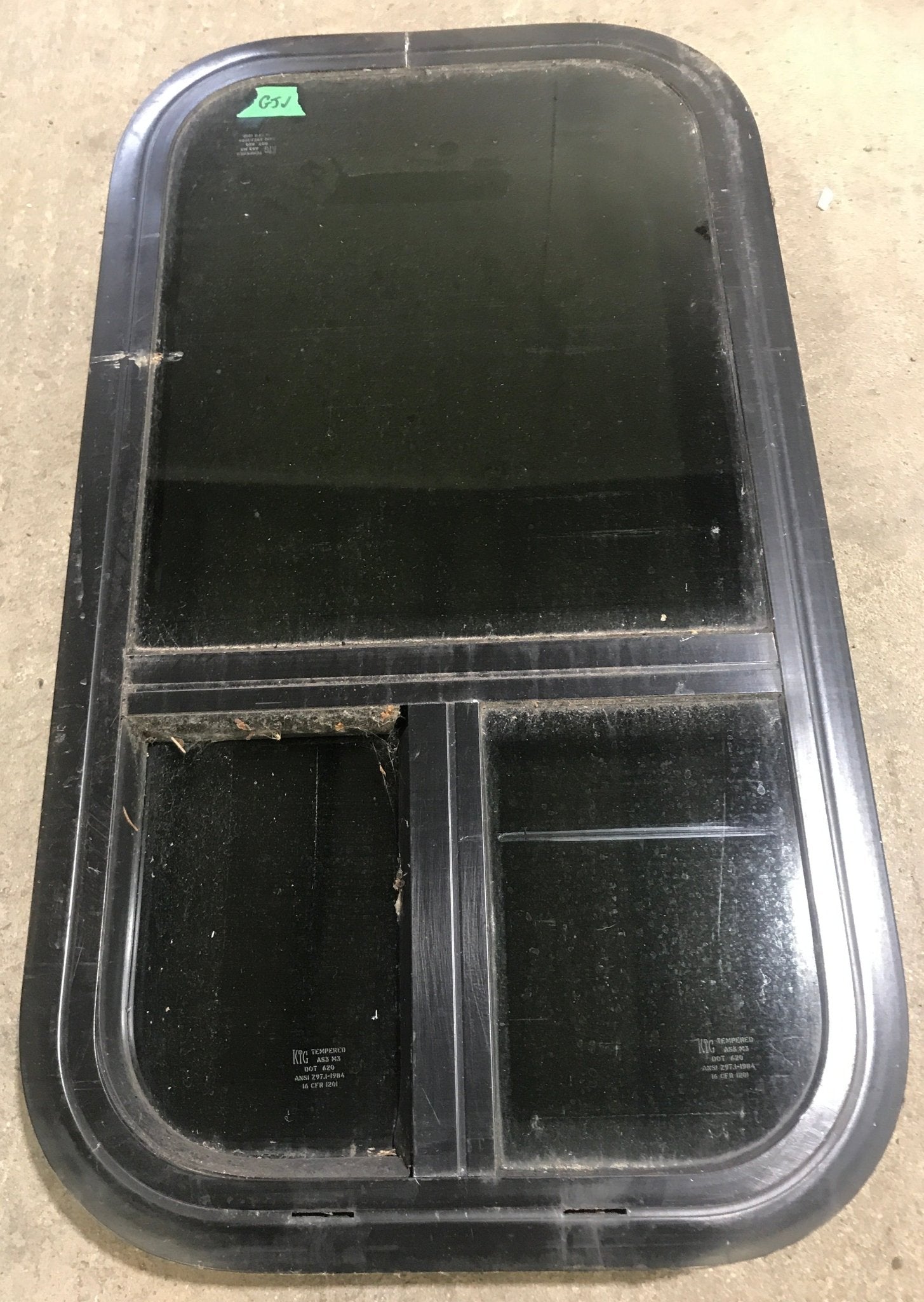 Used Black Radius Opening Window : 13 1/2" W x 25 1/2" H x 1 7/8" D - Young Farts RV Parts