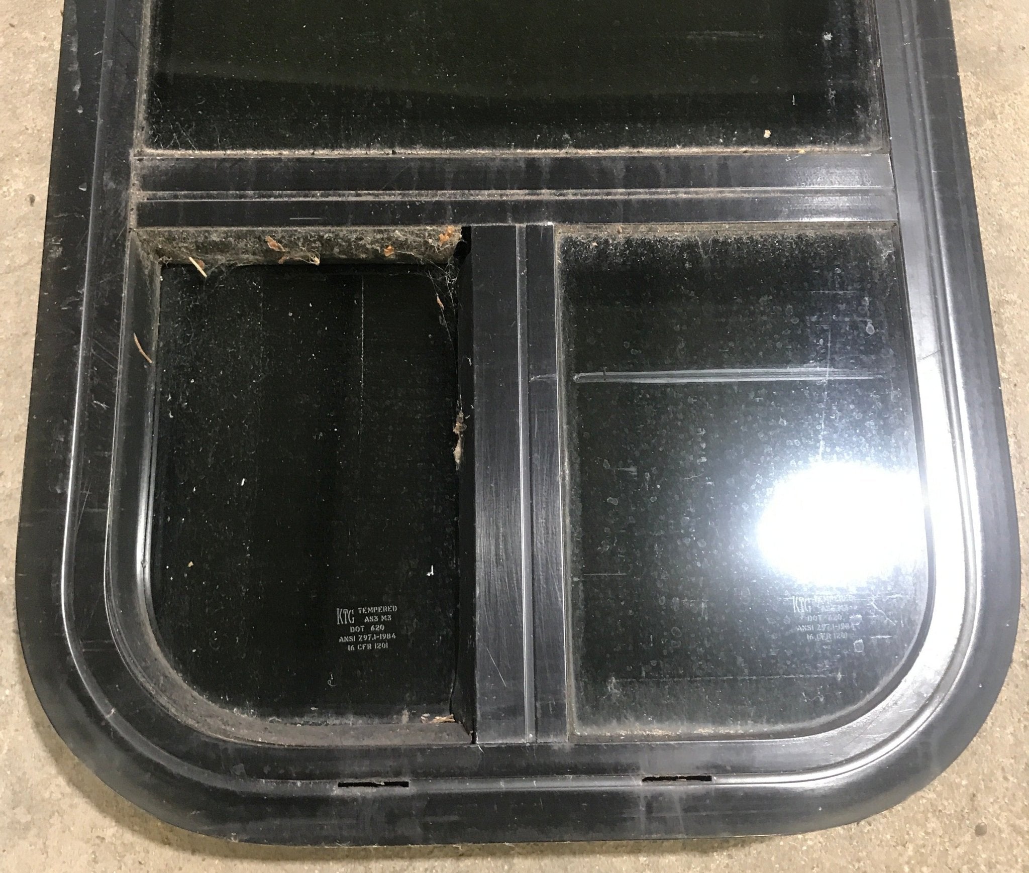 Used Black Radius Opening Window : 13 1/2" W x 25 1/2" H x 1 7/8" D - Young Farts RV Parts