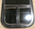 Used Black Radius Opening Window : 13 1/2" W x 25 1/2" H x 1 7/8" D - Young Farts RV Parts