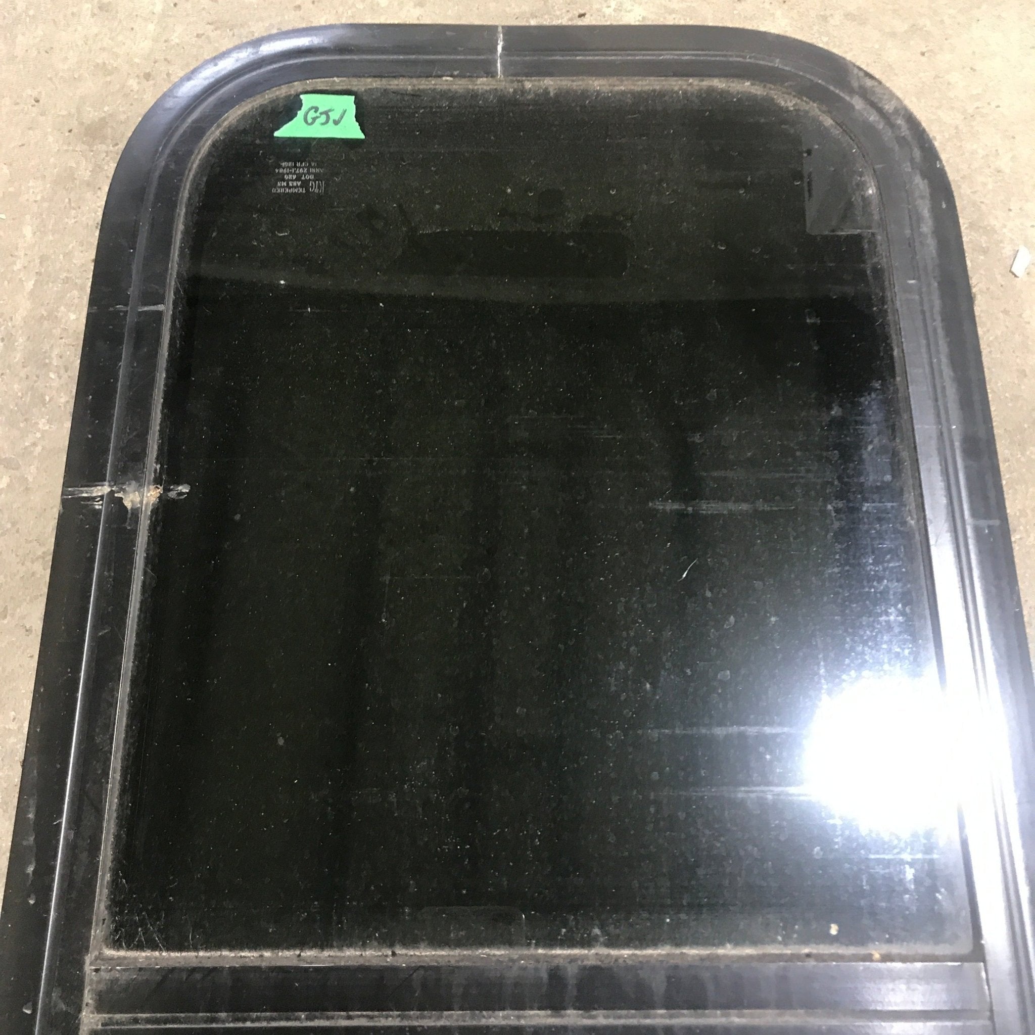 Used Black Radius Opening Window : 13 1/2" W x 25 1/2" H x 1 7/8" D - Young Farts RV Parts