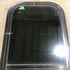 Used Black Radius Opening Window : 13 1/2" W x 25 1/2" H x 1 7/8" D - Young Farts RV Parts
