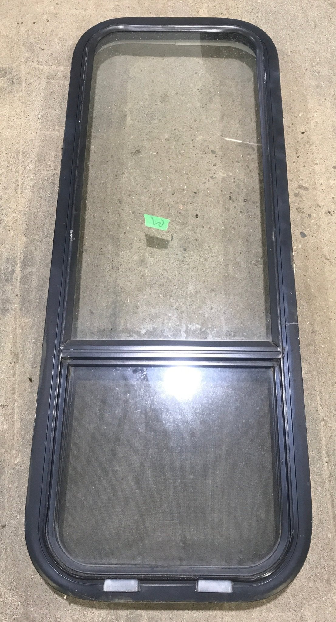 Used Black Radius Opening Window : 15 1/2" W x 41 1/2" H x 2" D - Young Farts RV Parts