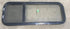 Used Black Radius Opening Window : 15 1/2" W x 41 1/2" H x 2" D - Young Farts RV Parts