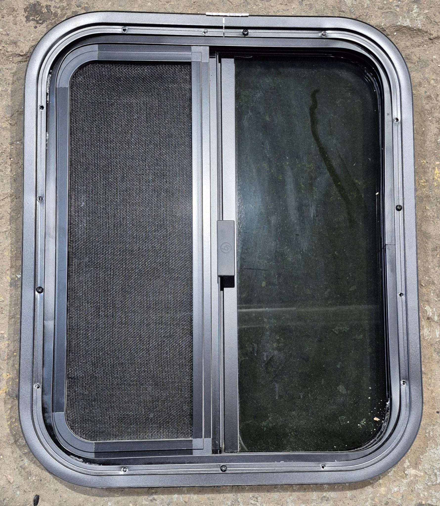 Used Black Radius Opening Window : 17 1/2" W x 21 1/2" H x 1 1/4" - Young Farts RV Parts