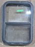 Used Black Radius Opening Window : 17 1/2" W x 25 1/4" H x 1 7/8" D - Young Farts RV Parts