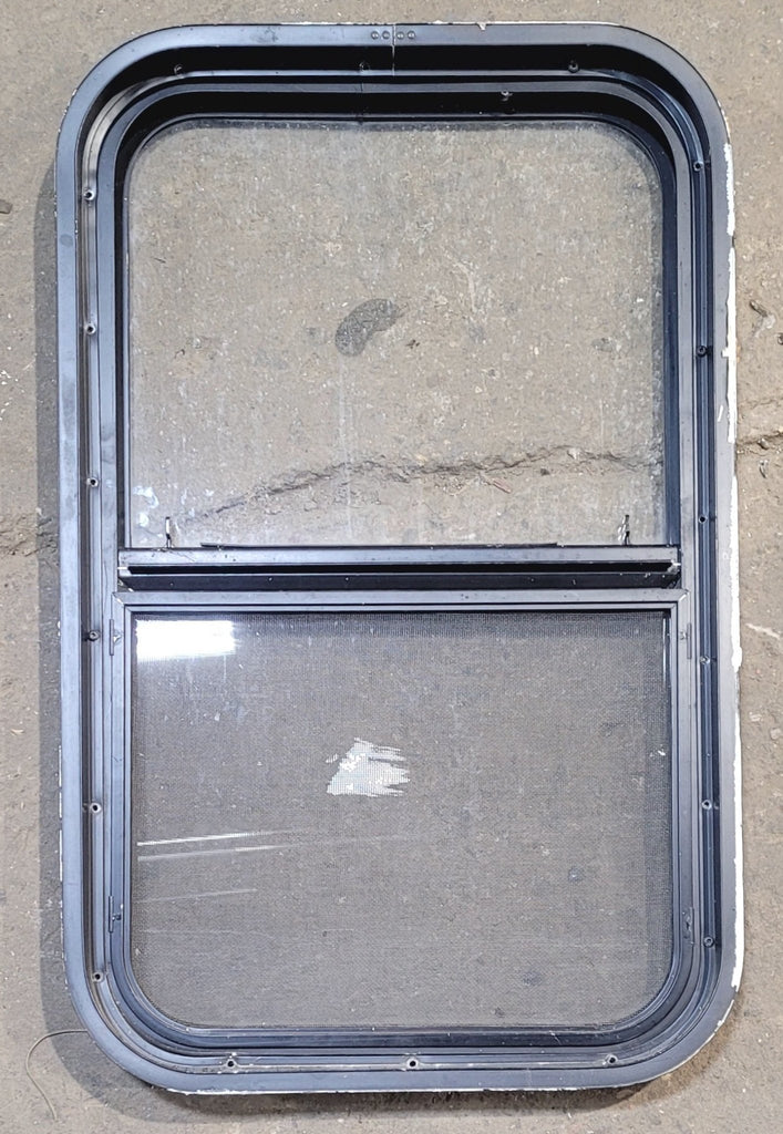 Used Black Radius Opening Window : 17 1/2" W x 28 1/2" H x 1 7/8" - Young Farts RV Parts