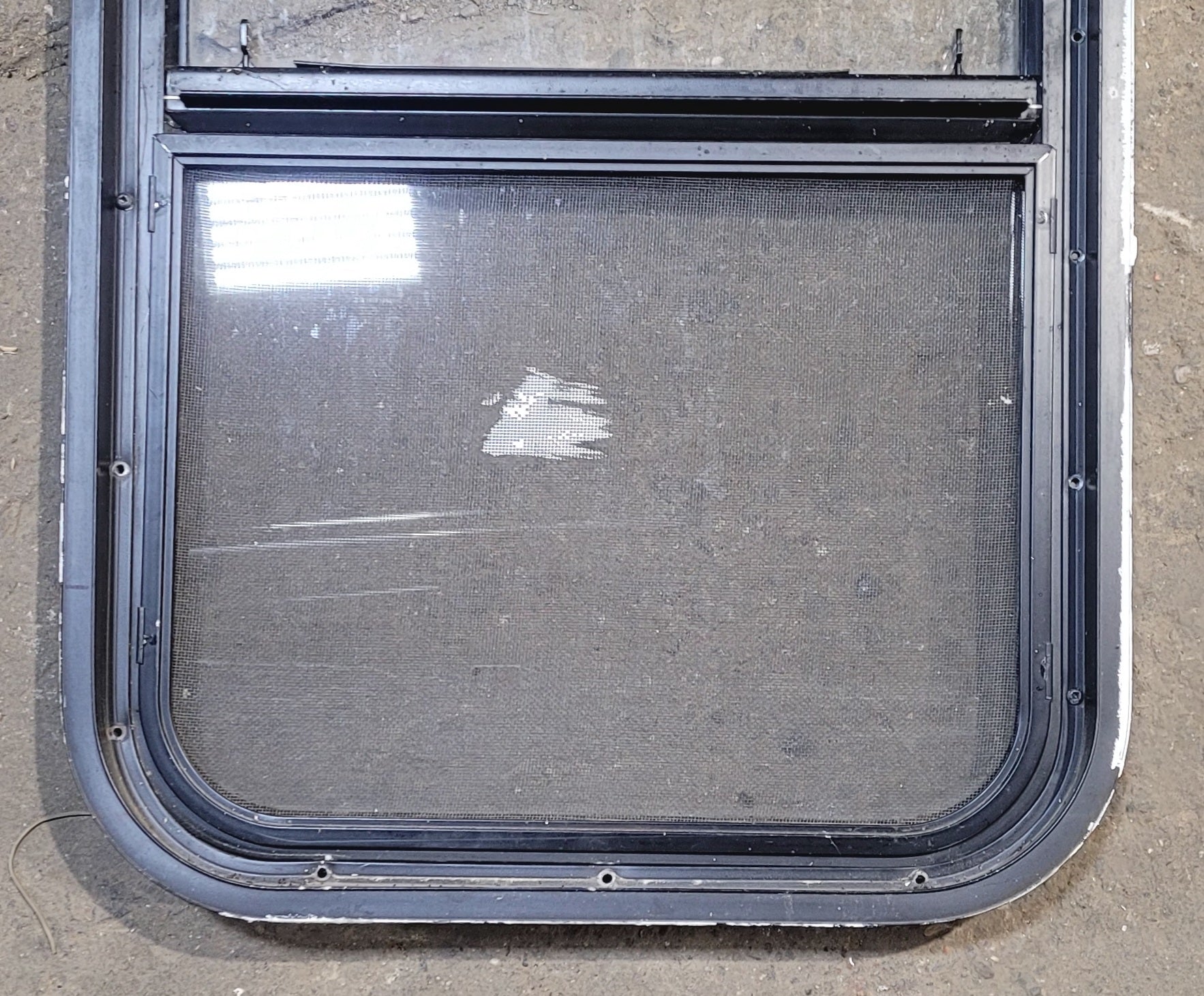 Used Black Radius Opening Window : 17 1/2" W x 28 1/2" H x 1 7/8" - Young Farts RV Parts