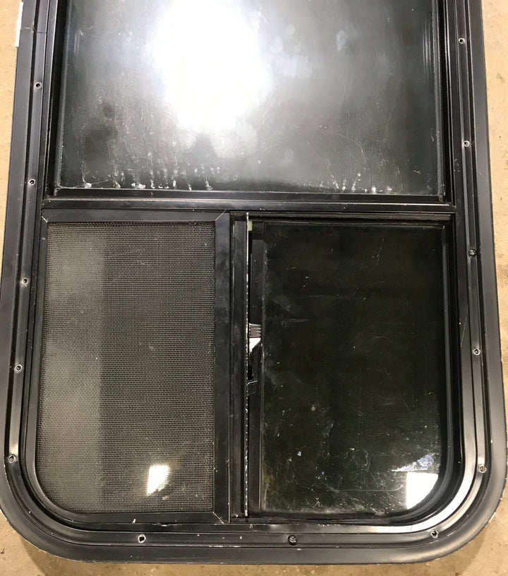 Used Black Radius Opening Window : 17 1/2" W x 39 1/2" H x 1 7/8" D - Young Farts RV Parts