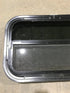 Used Black Radius Opening Window : 23 1/2" W x 14 1/2" H x 1 7/8" - Young Farts RV Parts