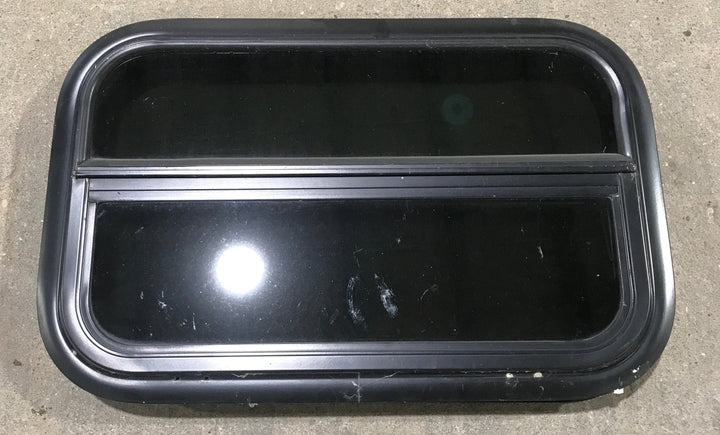 Used Black Radius Opening Window : 23 1/2" W x 14 1/2" H x 1 7/8" - Young Farts RV Parts