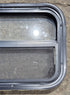 Used Black Radius Opening Window : 23 1/2" W x 14 1/4" H x 1 7/8" - Young Farts RV Parts
