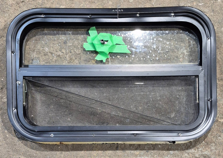 Used Black Radius Opening Window : 23 1/2" W x 14 1/4" H x 1 7/8" - Young Farts RV Parts