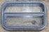 Used Black Radius Opening Window : 23 1/2" W x 14 1/4" H x 1 7/8" - Young Farts RV Parts