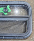 Used Black Radius Opening Window : 23 1/2" W x 14 1/4" H x 1 7/8" - Young Farts RV Parts