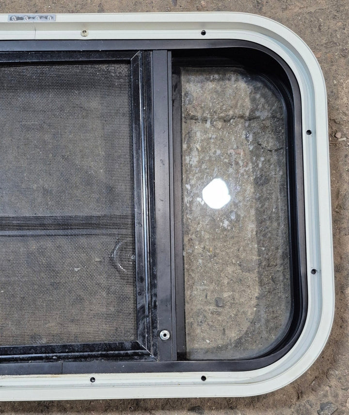 Used Black Radius Opening Window : 23 1/2" W x 14 3/4" H x 2" - Young Farts RV Parts