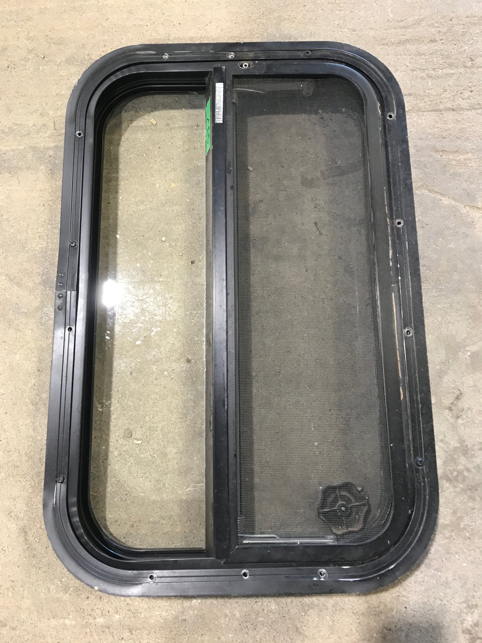Used Black Radius Opening Window : 23 1/2" W x 14 3/4" H x 2" - Young Farts RV Parts