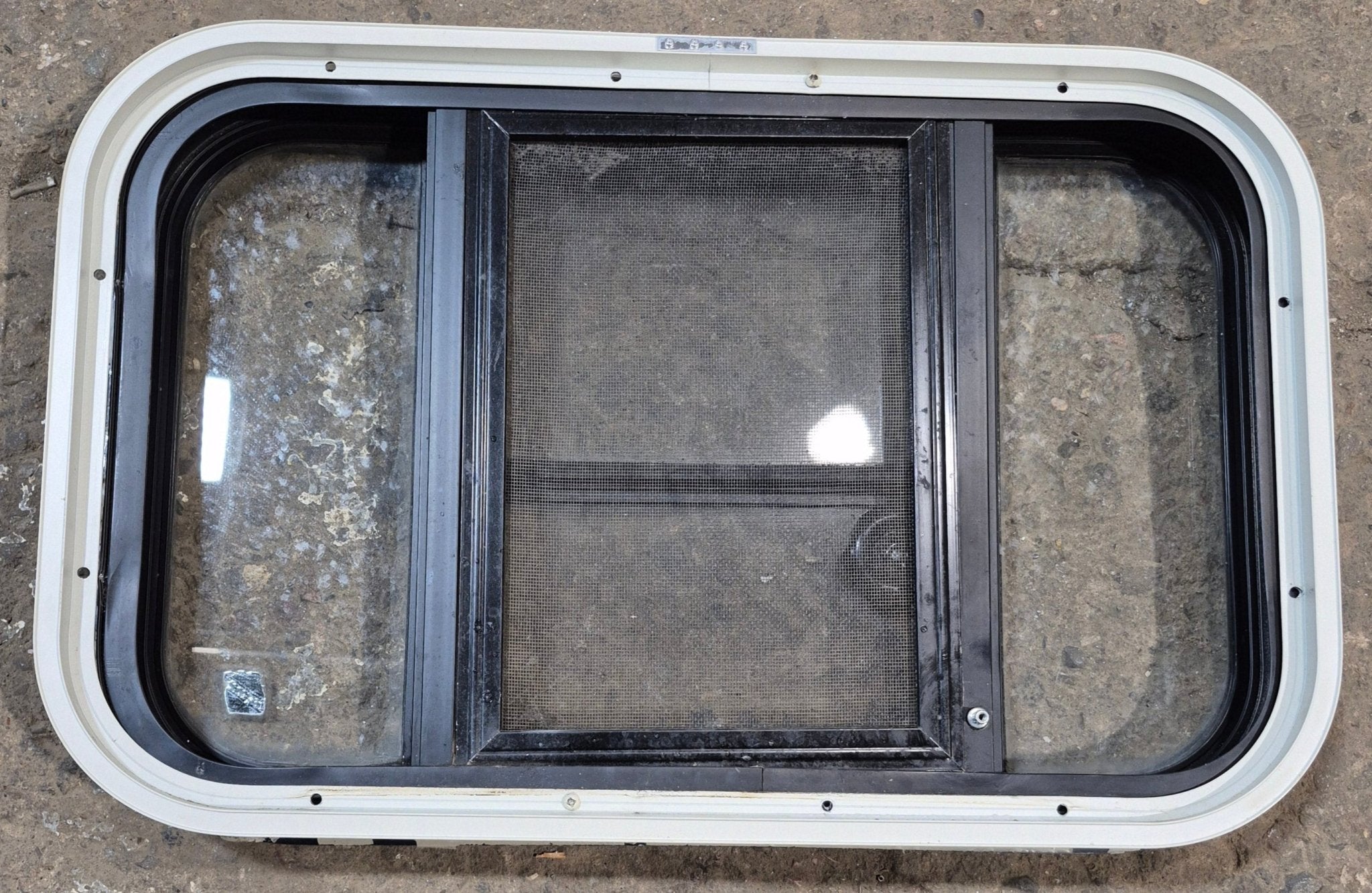 Used Black Radius Opening Window : 23 1/2" W x 14 3/4" H x 2" - Young Farts RV Parts
