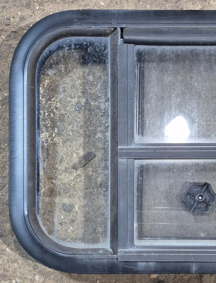 Used Black Radius Opening Window : 23 1/2" W x 14 3/4" H x 2" - Young Farts RV Parts