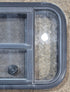Used Black Radius Opening Window : 23 1/2" W x 15 1/2" H x 1 7/8" - Young Farts RV Parts