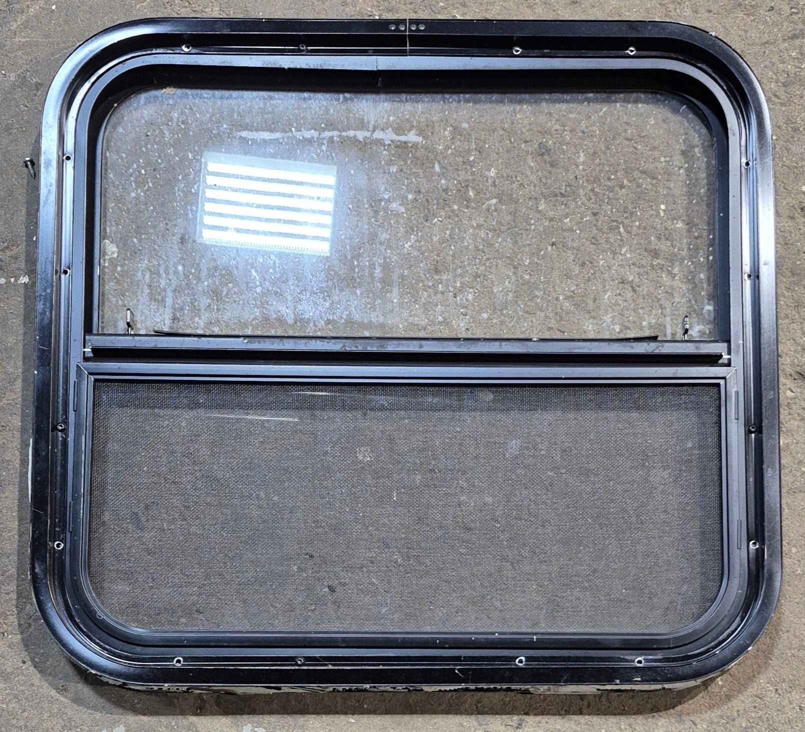 Used Black Radius Opening Window : 23 1/2" W x 21 1/2" H x 1 3/8" - Young Farts RV Parts