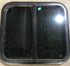 Used Black Radius Opening Window : 23 1/2" W x 21 1/2" H x 1 7/8" D - Young Farts RV Parts