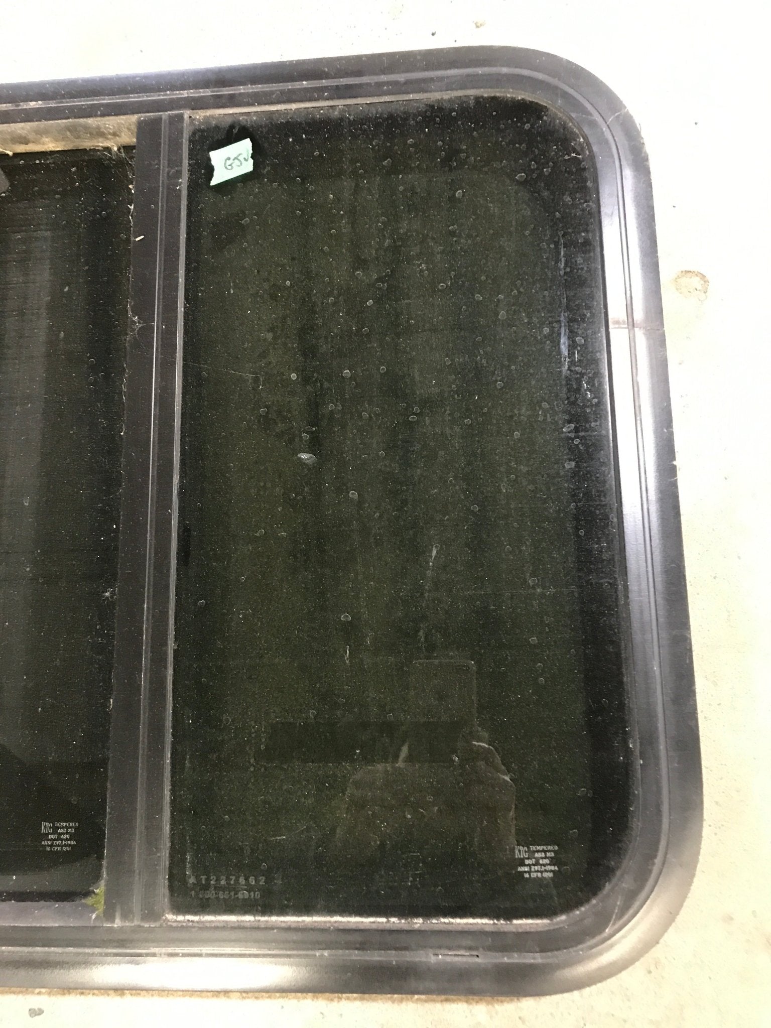 Used Black Radius Opening Window : 23 1/2" W x 21 1/2" H x 1 7/8" D - Young Farts RV Parts
