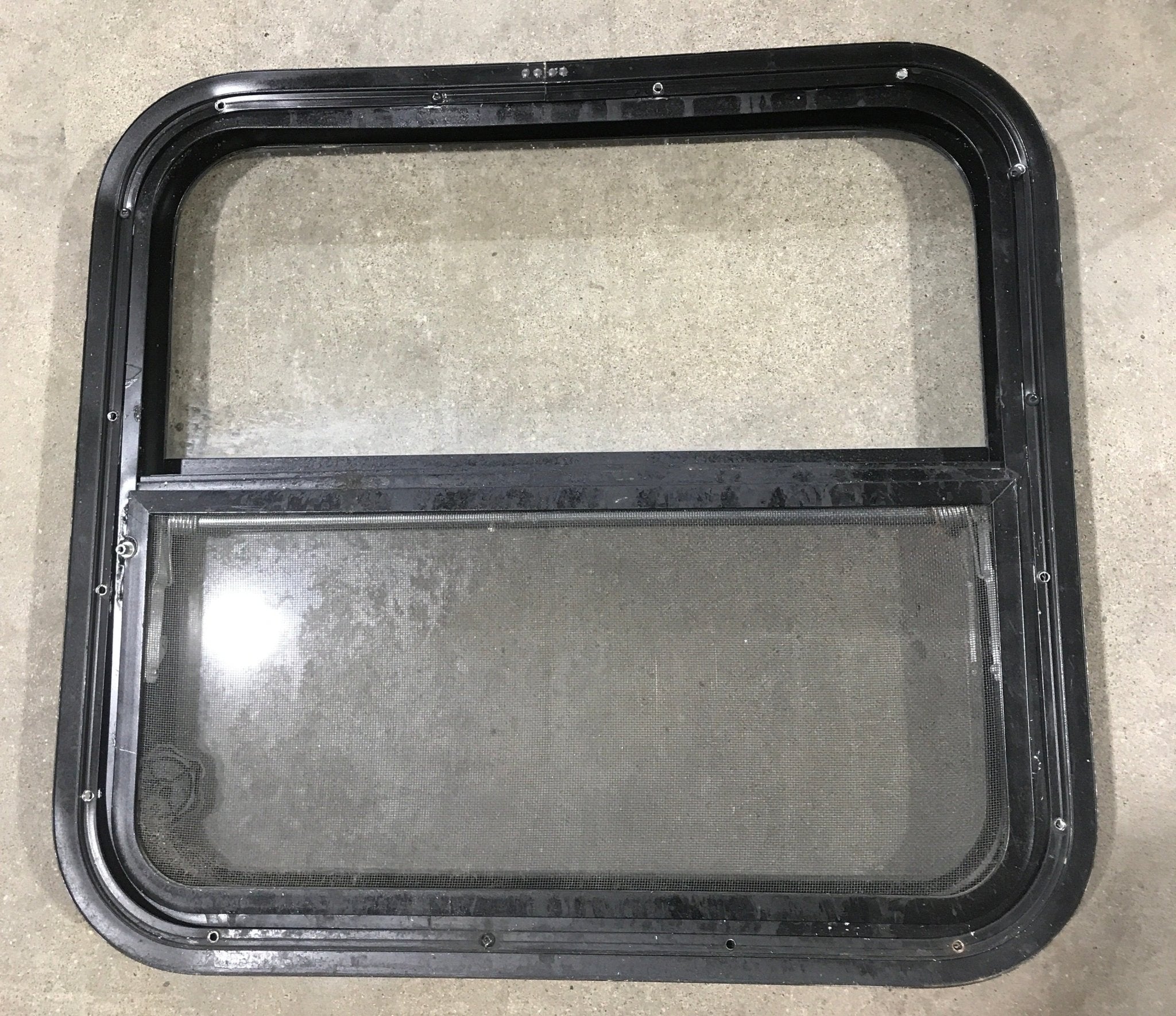 Used Black Radius Opening Window : 23 1/2" W X 21 1/4" H X 2" D - Young Farts RV Parts