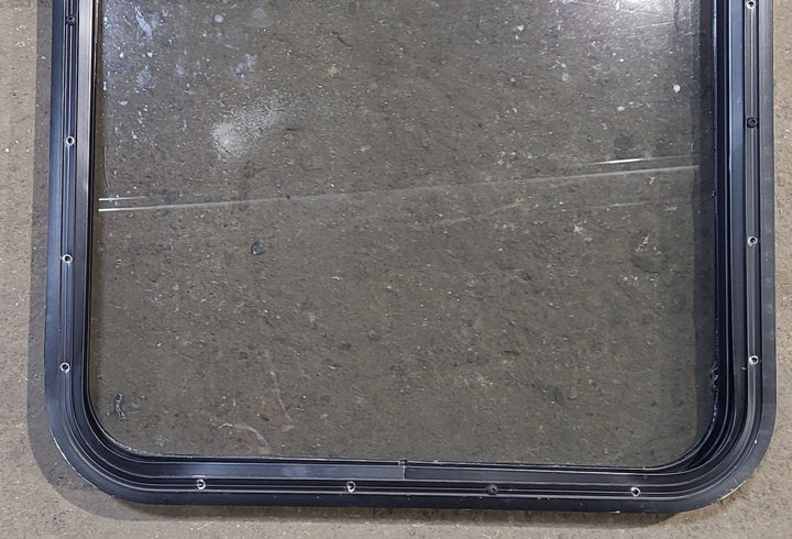 Used Black Radius Opening Window : 23 1/2" W x 28 3/4" H x 1 3/4" D - Young Farts RV Parts
