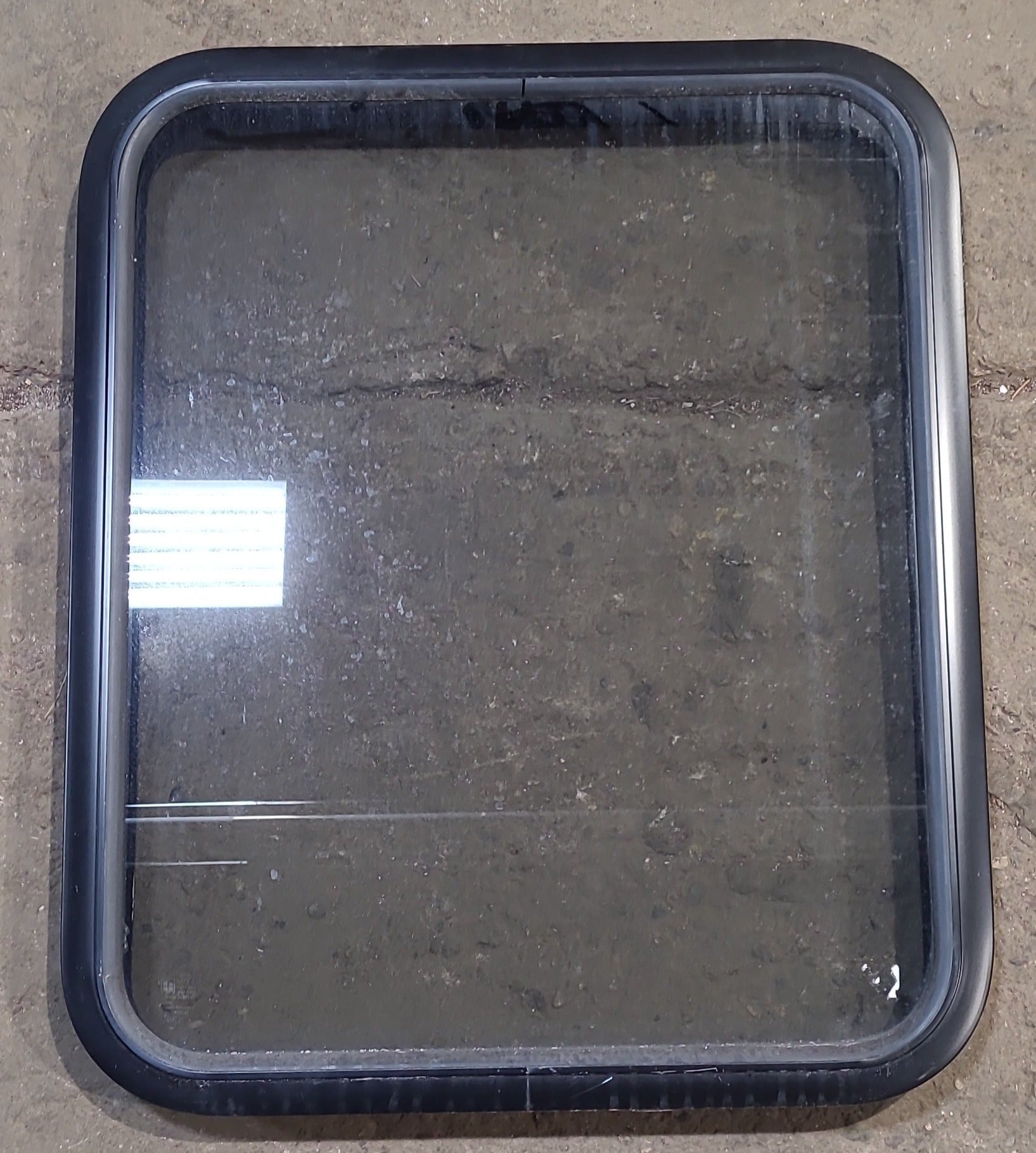 Used Black Radius Opening Window : 23 1/2" W x 28 3/4" H x 1 3/4" D - Young Farts RV Parts