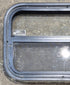 Used Black Radius Opening Window : 23 1/4" W x 14 1/4" H x 1 7/8" - Young Farts RV Parts