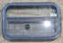 Used Black Radius Opening Window : 23 1/4" W x 14 1/4" H x 1 7/8" - Young Farts RV Parts