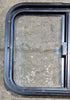 Used Black Radius Opening Window : 23 1/4" W x 17 1/4" H x 1 3/4" - Young Farts RV Parts
