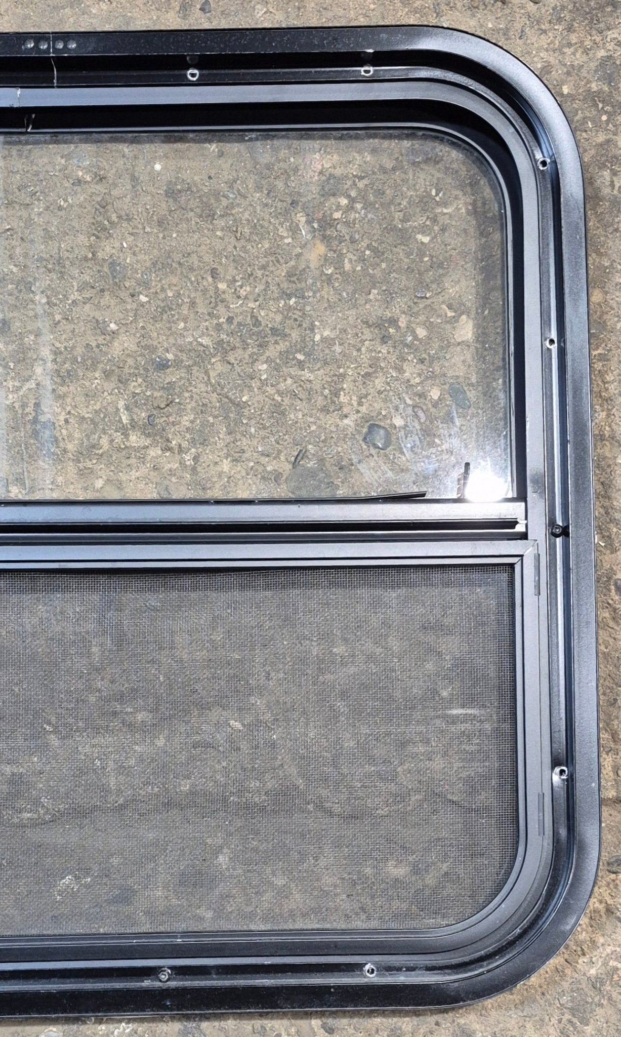 Used Black Radius Opening Window : 23 1/4" W x 21 1/4" H x 1 1/2" - Young Farts RV Parts