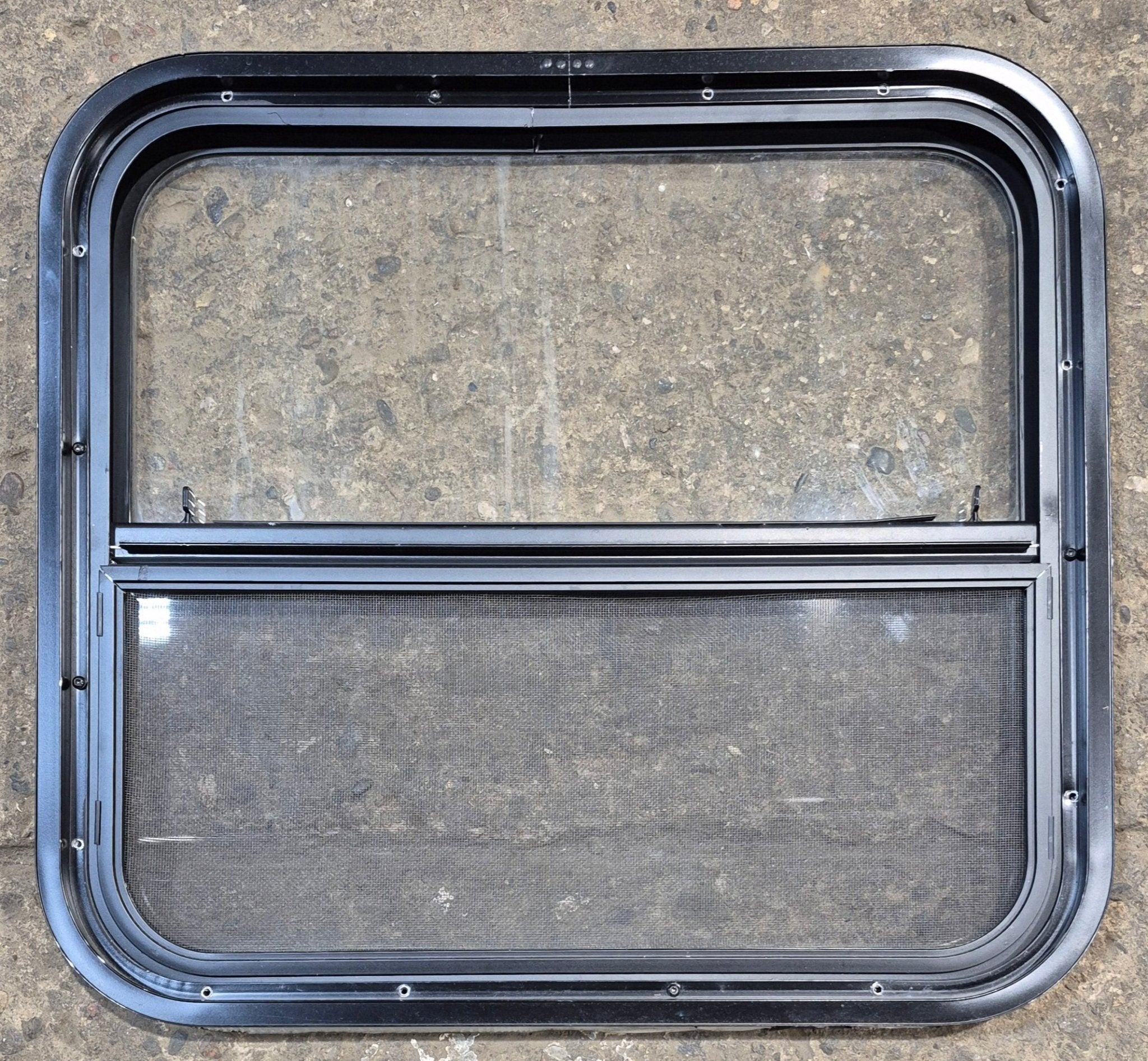 Used Black Radius Opening Window : 23 1/4" W x 21 1/4" H x 1 1/2" - Young Farts RV Parts
