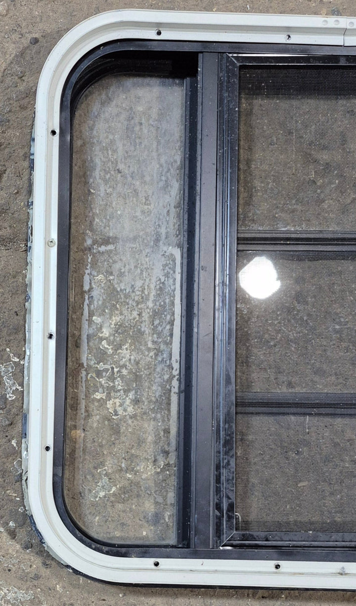 Used Black Radius Opening Window : 23 1/4" W x 21 3/4" H x 1 7/8" - Young Farts RV Parts