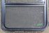 Used Black Radius Opening Window : 23 1/4" W x 28 1/4" H x 1 3/4" D - Young Farts RV Parts