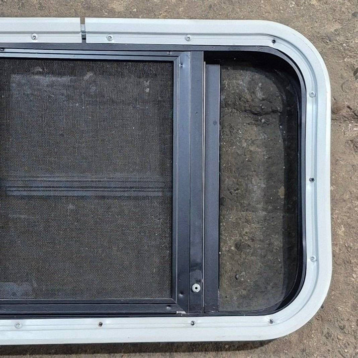 Used Black Radius Opening Window - 23 1/8" X 14 1/2" X 1 7/8" - Young Farts RV Parts