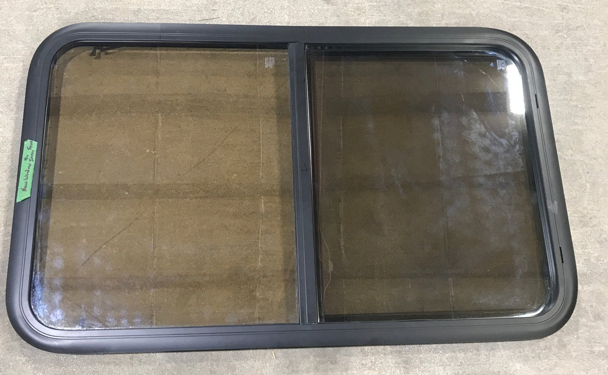 Used Black Radius Opening Window : 23 3/4" W x 39 3/4" H x 1 1/2" D - Young Farts RV Parts