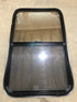 Used Black Radius Opening Window : 23 3/4" W x 39 3/4" H x 1 1/2" D - Young Farts RV Parts
